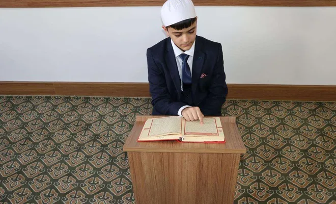 Babasının hafız olma hayalini oğlu gerçekleştirdi